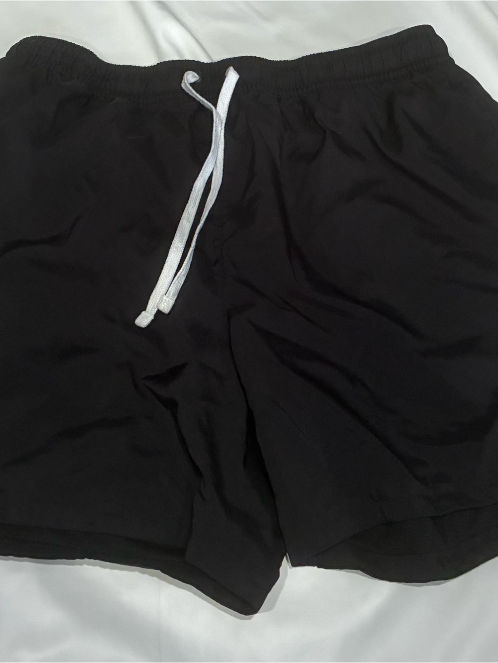 Nike Black Athletic Shorts with White Logo Tag
